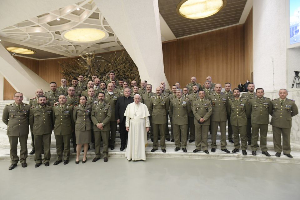 Pope Francis is pictured with members of the Italian Army during his general audience in the Paul VI hall at the Vatican March 2, 2022. (CNS photo/Vatican Media)