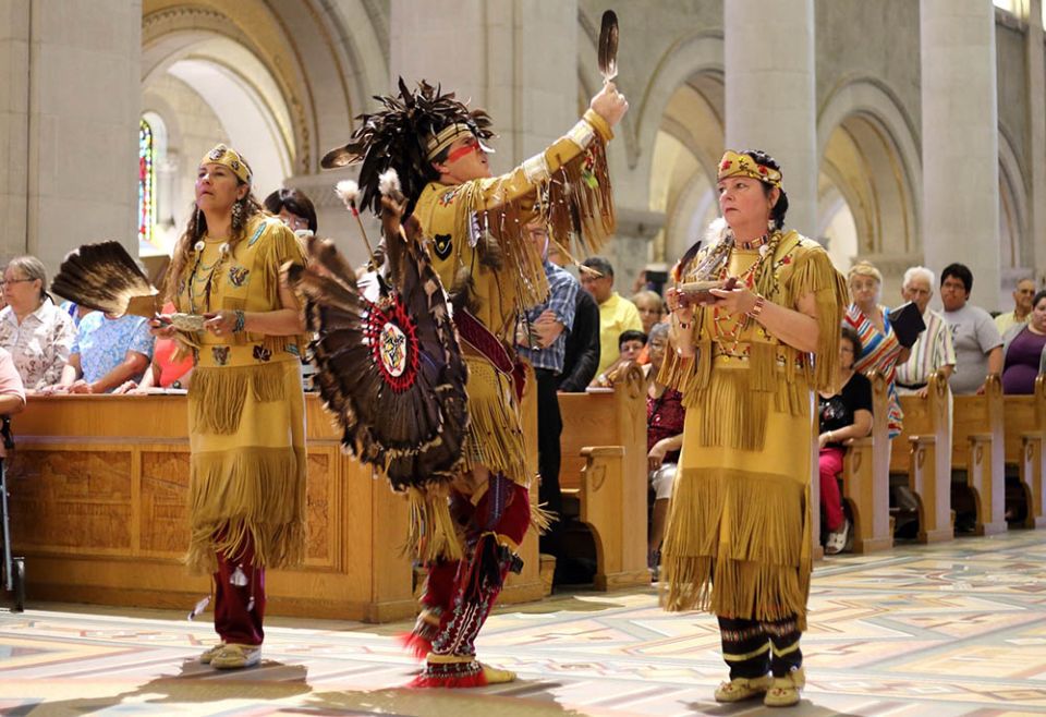 Members of the Huron-Wendat Nation perform a purification ritual at the Basilica of Sainte-Anne-de-Beaupré in Quebec June 26, 2016. (CNS/Presence/Philippe Vaillancourt)