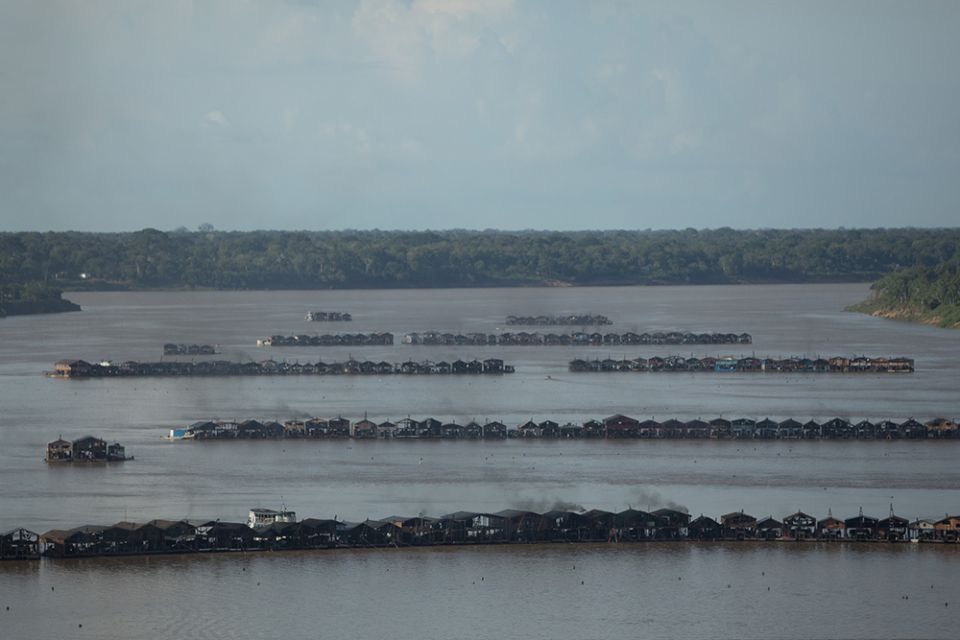 Gold mining rafts and dredges are seen on the Madeira River in Brazil. (Greenpeace Brazil/Bruno Kelly)