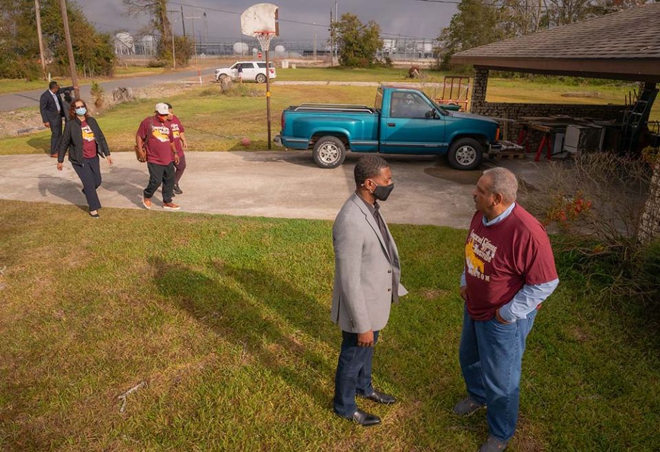 U.S. Environmental Protection Agency Administrator Michael Regan, left, meets with community members in Mossville, Louisiana, in November 2021 as part of an environmental justice tour of three Southern states. (Flickr/US EPA/Eric Vance)