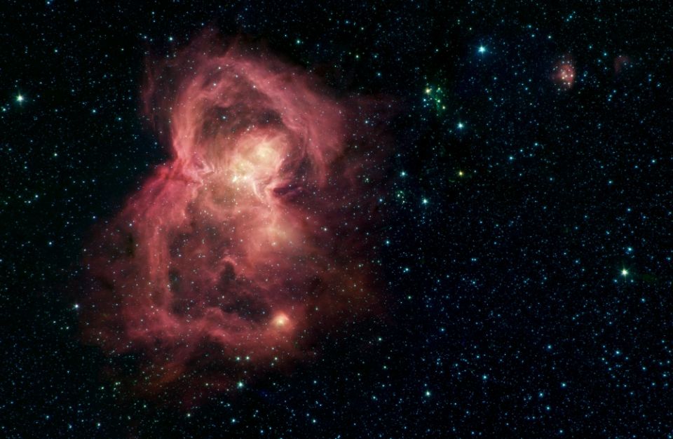 Infrared image from NASA's Spitzer Space Telescope of the W40 nebula — a giant cloud of gas and dust in space where new stars may form (NASA/JPL-Caltech)