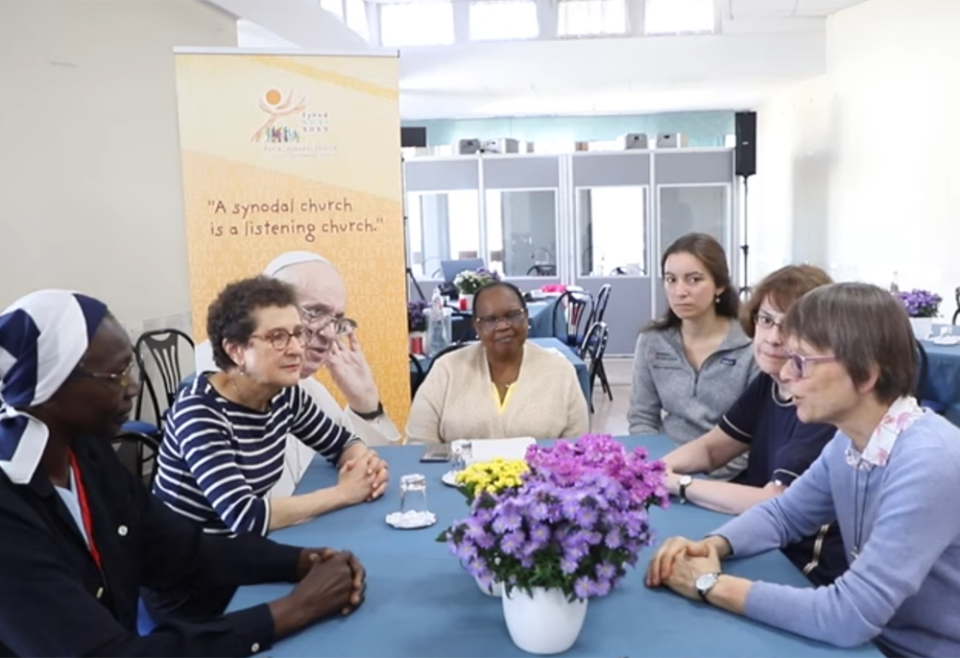 Women who attended the gathering in Frascati outside of Rome are pictured in a Vatican synod video. From left: Sr. Anne-Béatrice Faye; Susan Pascoe; Philomena Njeri Mwaura; Maike Sieben; Sr. Gill Goulding, and Sr. Brigit Weiler. (NCR screenshot/YouTube/Sy