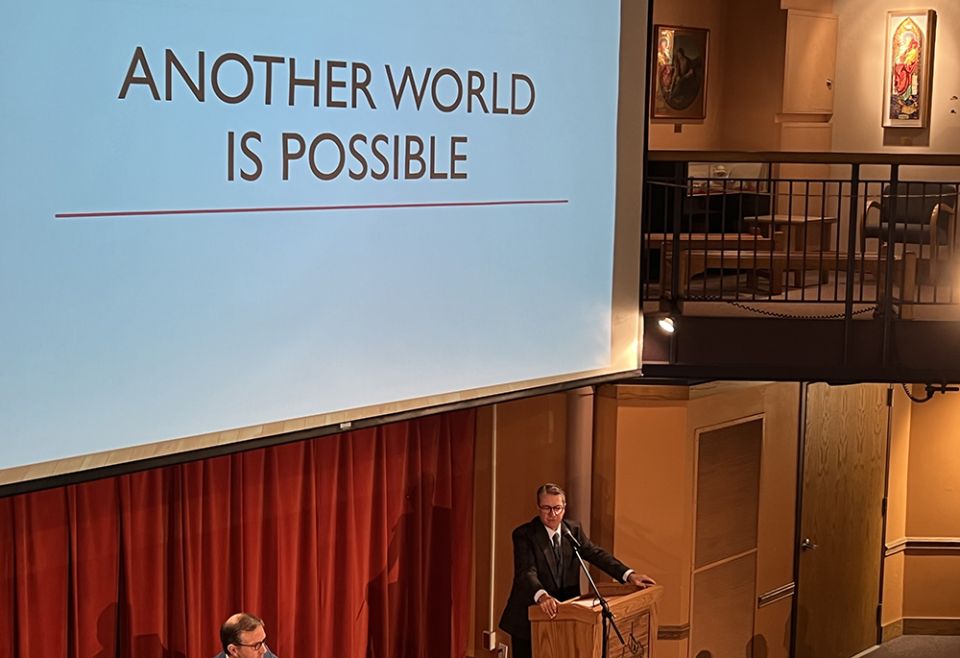 University of Notre Dame professor Patrick Deneen declares that "another world is possible" in a talk he delivered during the Oct. 7-8 conference, "Restoring A Nation: The Common Good in the American Tradition." (NCR photo/Brian Fraga) University of Notre Dame professor Patrick Deneen declares that "another world is possible" in a talk he delivered during the Oct. 7-8 conference, "Restoring A Nation: The Common Good in the American Tradition." (NCR photo/Brian Fraga)