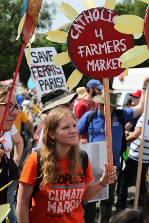 Kelly Moltzen, with the Franciscan Action Network, participates during the People's Climate March in Washington April 29, 2017. (CNS/Dennis Sadowski)
