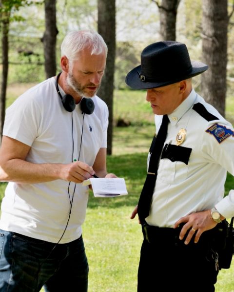 Writer-director Martin McDonagh talks to actor Woody Harrelson on the set of "Three Billboards Outside Ebbing, Missouri." (Fox Searchlight/Merrick Morton)