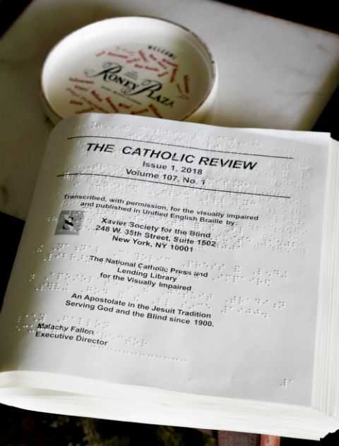 Catholic materials in Braille are seen at the residence of Adelina Maideski. (CNS/Tom Tracy)