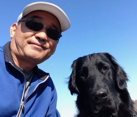 Philip Sakimoto and his dog