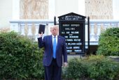 President Donald Trump holds a Bible as he stands in front of St. John's Episcopal Church in Washington June 1. (CNS/Reuters/Tom Brenner)