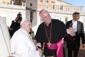 Archbishop Nelson J. Pérez of Philadelphia takes a selfie with Pope Francis at the end of the pope's weekly general audience in St. Peter's Square Oct. 12, 2022
