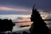 A leader of the Celia Xakriaba peoples walks along the banks of the Xingu River in Brazil's Xingu Indigenous Park Jan. 15, 2020. 