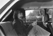 George Harrison is pictured in the back seat of a car as he leaves the Hilton hotel in Amsterdam, the Netherlands, Feb 4, 1977. (National Archives, Anefo collection/Suyk, Koen)
