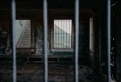 View of prison bars (Unsplash/Christina Boemio)