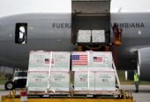 U.S. flags are taped on a shipment of Johnson & Johnson COVID-19 vaccines in Bogota, Colombia, July 1. (CNS photo/Nathalia Angarita, Reuters)