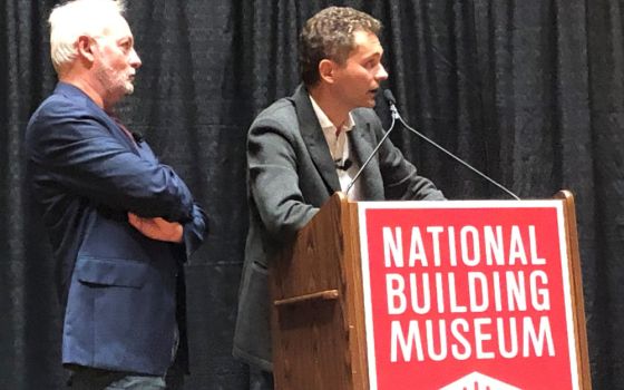 Philippe Villeneuve and Rémi Fromont, the chief architects leading the restoration of Notre-Dame Cathedral in Paris after the 2019 fire, speak Sept. 26, 2022, at the National Building Museum in Washington