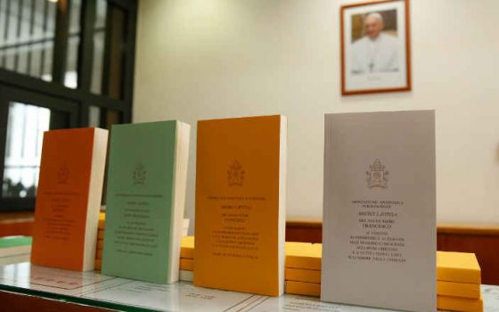 Copies of Pope Francis' apostolic exhortation "Amoris Laetitia" ("The Joy of Love") at the document's release at the Vatican April 8, 2016. (CNS/Paul Haring)